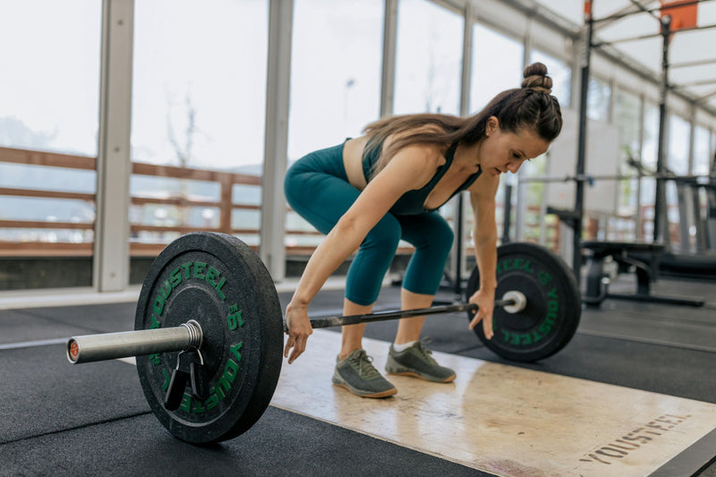 a woman lifting weights